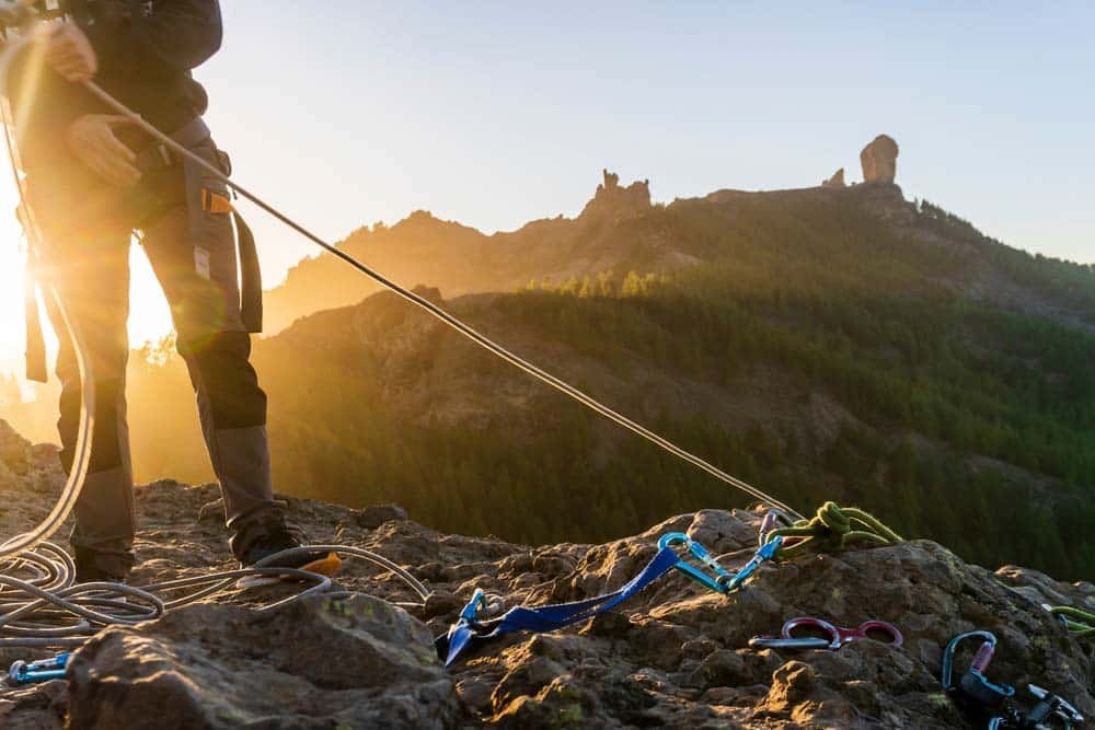 man preparing rappel