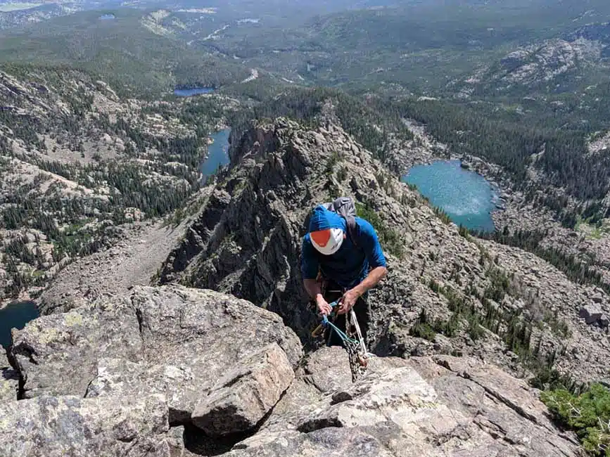 man setting up rappel safely