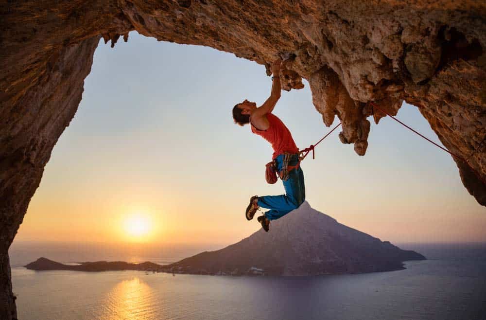 man climbing roof in kalymnos