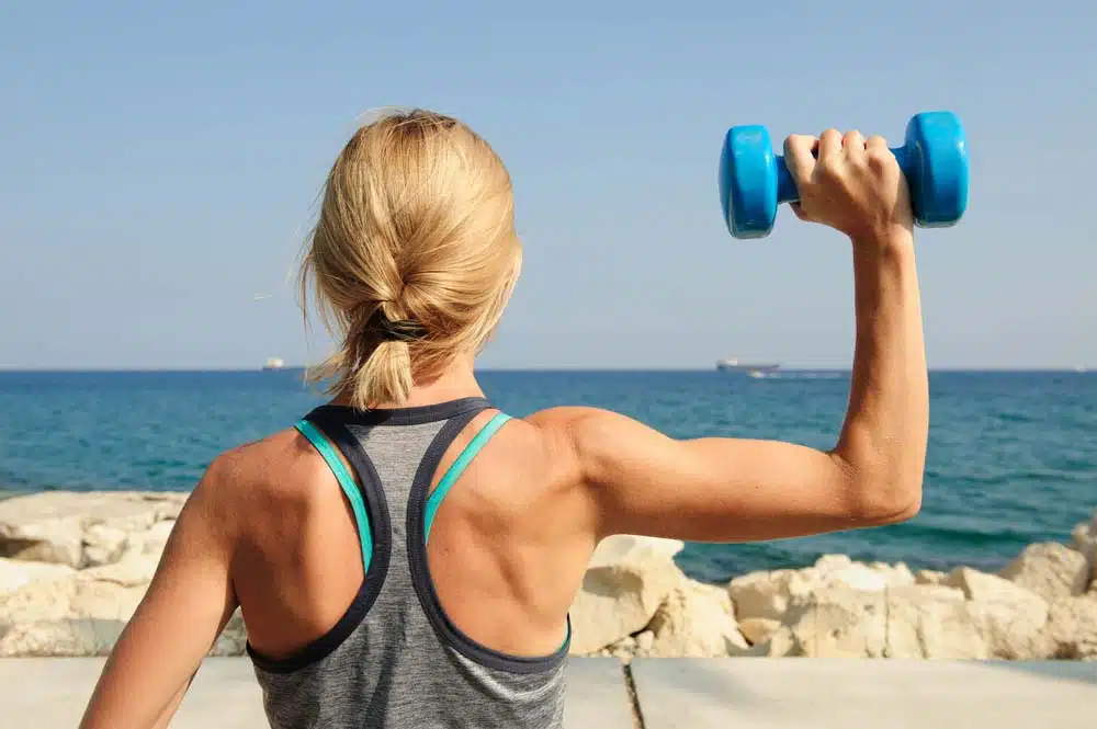 woman performing elevated shoulder rotation