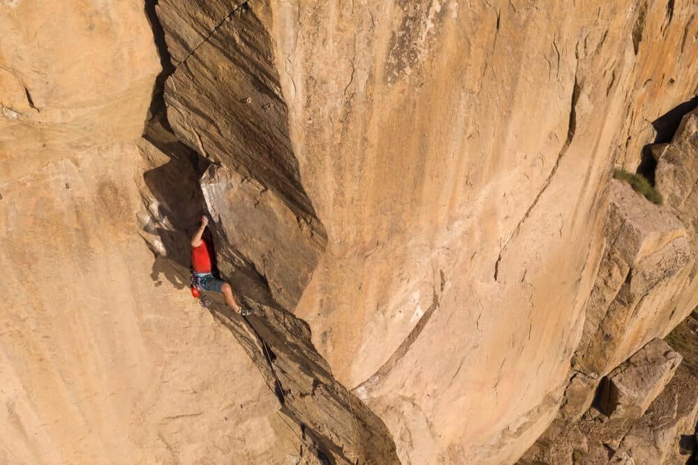 climber crack climbing in utah