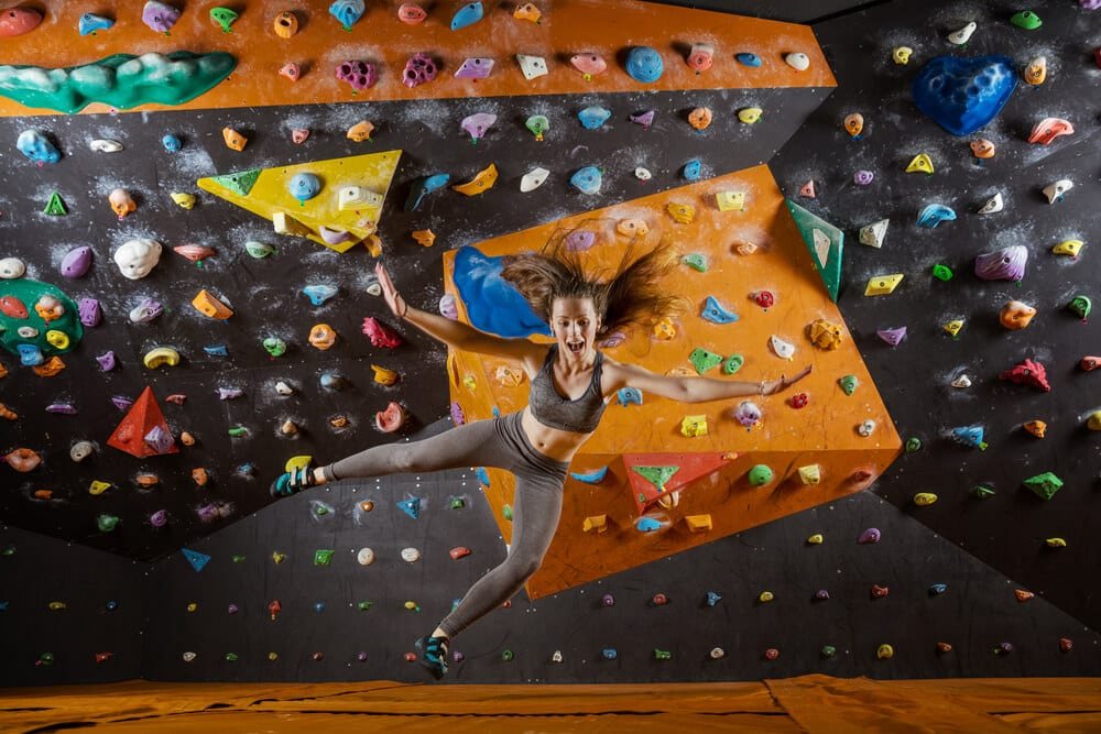 woman falling from boulder