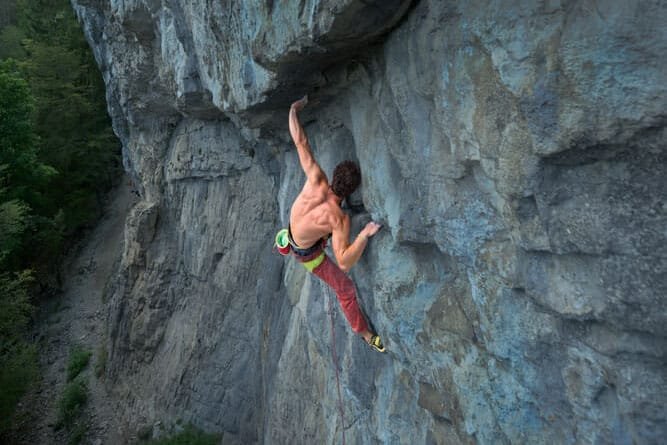 man performing gaston hold on undercling