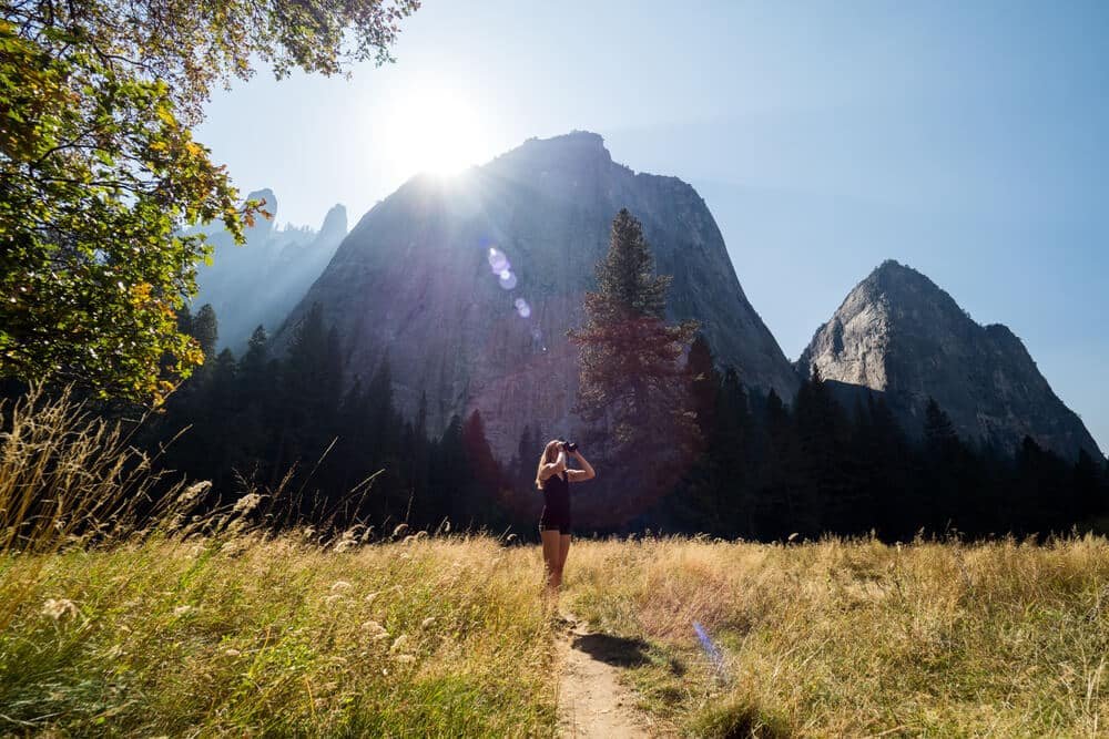 tourits in yosemite meadow