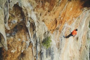 climber resting on bolt